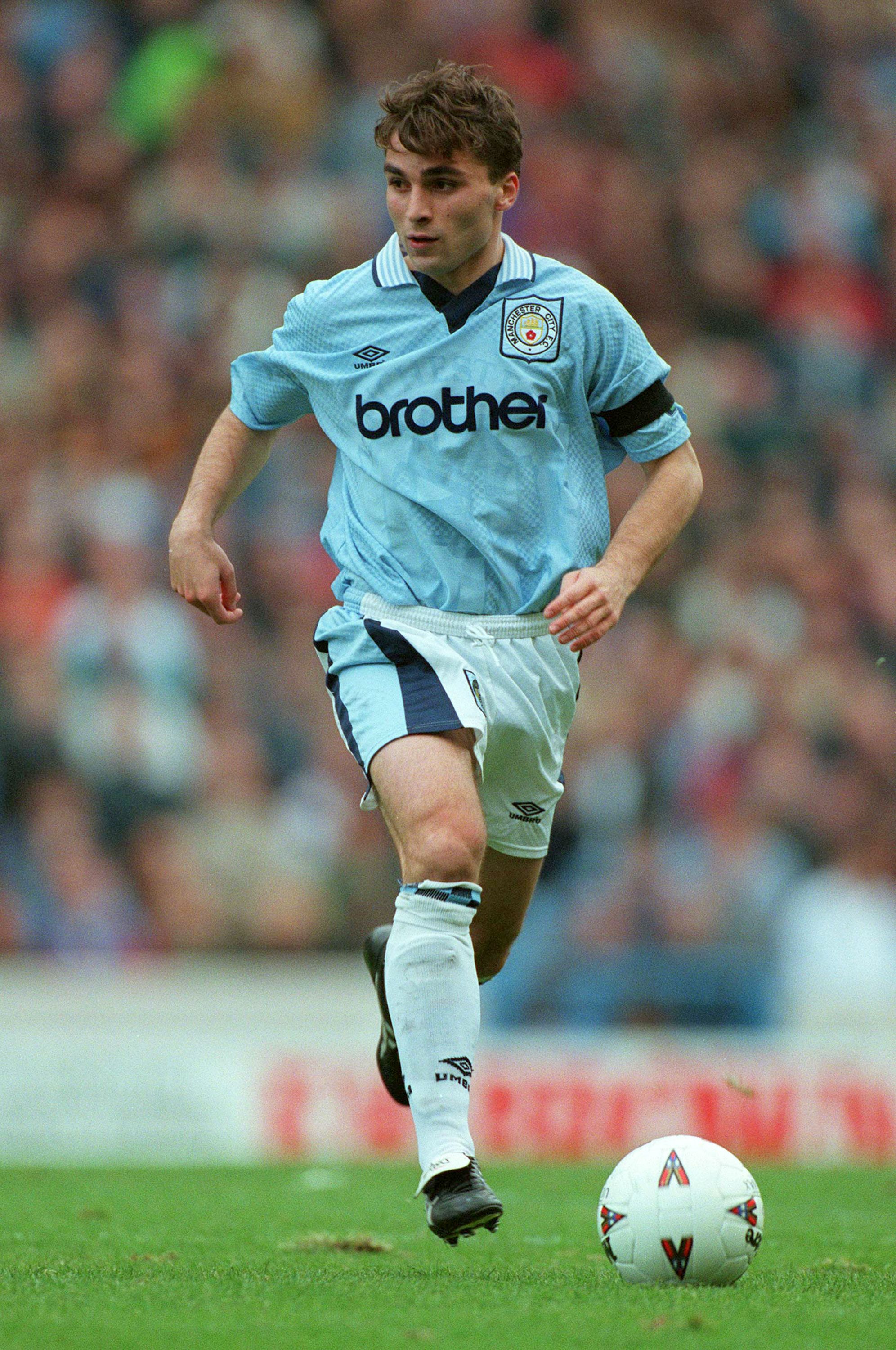 Giorgi Kinkladze on the ball for Manchester City in the 1995–96 laser-blue Umbro kit